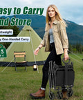 Woman carrying Heavy Duty Collapsible Wagon Cart Foldable 37 Inch Long Frame With 480 Lb Capacity for outdoor use.