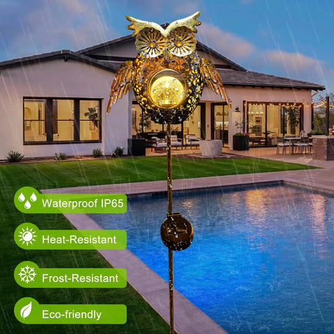 Bronze owl solar garden stake illuminated by pool, showcasing Solar Owl Garden Stake Lights For Lawn And Pathway, IP65 weatherproof.