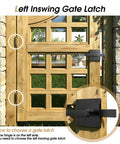 Tough As Nails Double Sided Gate Latch For Left Inswing Wooden Fences installed on a wooden gate with a stone backdrop.