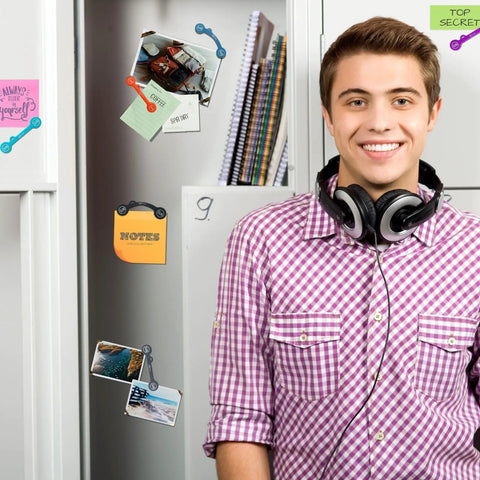 Magnetic Cable Clips Set Of 12 for Cable Management and Organization attached to a locker with notes and photos
