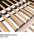 Detail of bentwood slats on Valentina Twin Upholstered Daybed With Trundle In Pink Velvet For Sleepovers And Quick Guest Beds