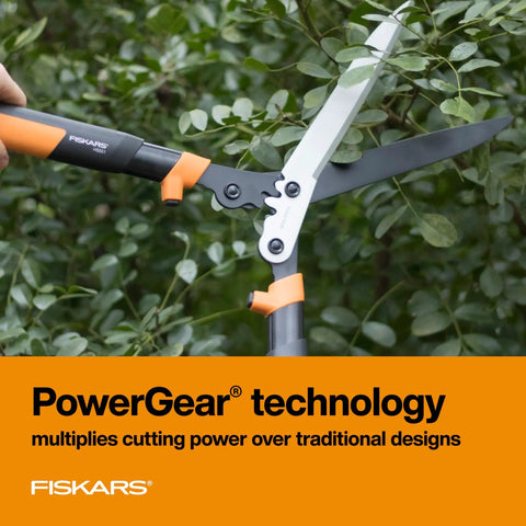 23 Inch Hedge Shears With PowerGear2 Technology trimming branches, showing sharp blades in garden setting