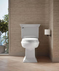 Top Shelf Elongated Toilet Seat With Silent Shut Lids And Seats, No Sweat Grip Tight Mounting Hardware For Easy Swap, ReadyLatch Positive Lock Mechanism, Nightlight Ready Option In Pristine White on modern bathroom floor.