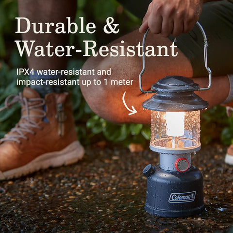Beast Bright 800 Lumen LED Lantern with USB Charging Ports near hiking boots, showcasing IPX4 water resistance and rugged carabiner handle.