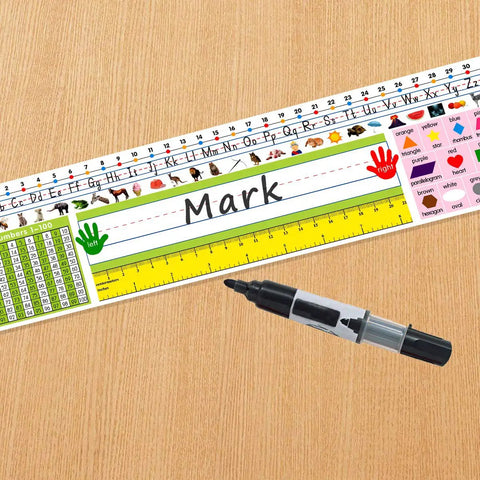 Self Adhesive Desk Nameplates Set For Primary Students Pack Of 36 14 By 4 Inches with marker on wood surface