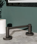 Matte Black Toilet Paper Holder With Double Post Pivoting Roll Arm For Wall Mount Heavy Duty Stainless Steel And Zinc Alloy Detachable Design No Slip Roll Easy Refill Durable Bathroom Accessory on countertop