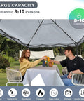 10x10 Pop Up Canopy Tent With Side Walls Waterproof Portable Shade For Camping, backyard picnic setup with two people toasting.