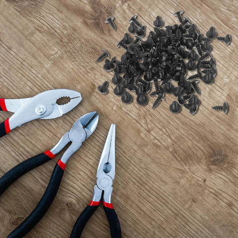 Hardcore Carbon Steel Mini Wood Screws Deep Thread Fasteners Furniture Hardware Kit No Sweat Assembly Tough Little Bolts For Home Repair Heavy Duty Small Screw Replacement Kit 100 Pack with pliers on wood surface.