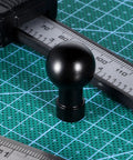 Durable Aluminum 17mm Ball Head Mount With A One Quarter Inch Twenty Screw on measuring grid