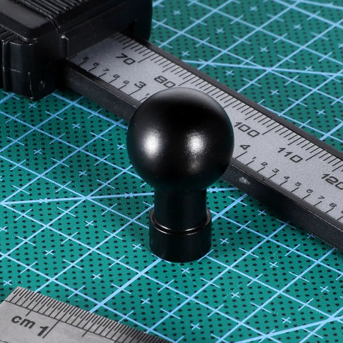 Durable Aluminum 17mm Ball Head Mount With A One Quarter Inch Twenty Screw on measuring grid
