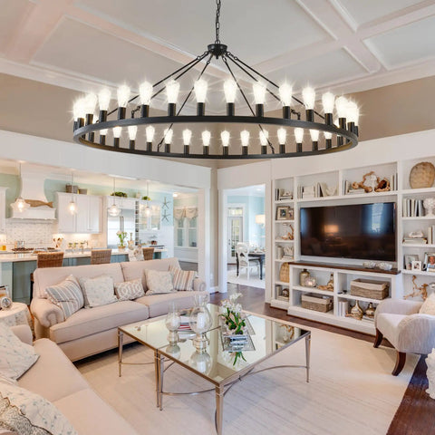 Massive Black Wagon Wheel Chandelier, 64 Inch, 30-Light Farmhouse Round Industrial Ceiling Light Fixture in a living room setting