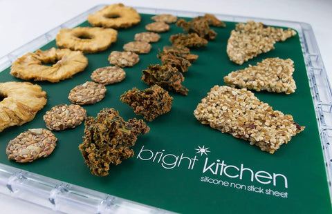 Heavy Duty Silicone Non Stick Dehydrator Mats For 6 Tray Ovens And Countertops Tough No Fuss Kitchen Baking Sheets showcasing dried fruits and snacks.