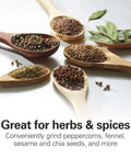 Wooden spoons with mixed spices and herbs, highlighting the Fresh Grind Electric Coffee Grinder For Beans, Spices And More.
