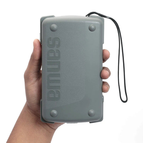 Hand holding CD800a Digital Multimeter All-In-One DMM with integrated case and lanyard, ideal for professionals and hobbyists.