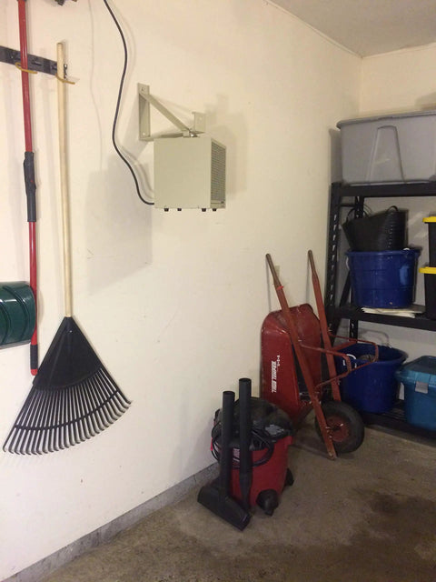 Garage with HF5848TC Beefy Garage And Workshop Portable Heater mounted on wall near cleaning tools