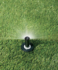 High Efficiency PRS Pop Up Sprinkler 1802HV15PR in operation with grass, 0 to 360 degree adjustable coverage, 2 inch pop up height.