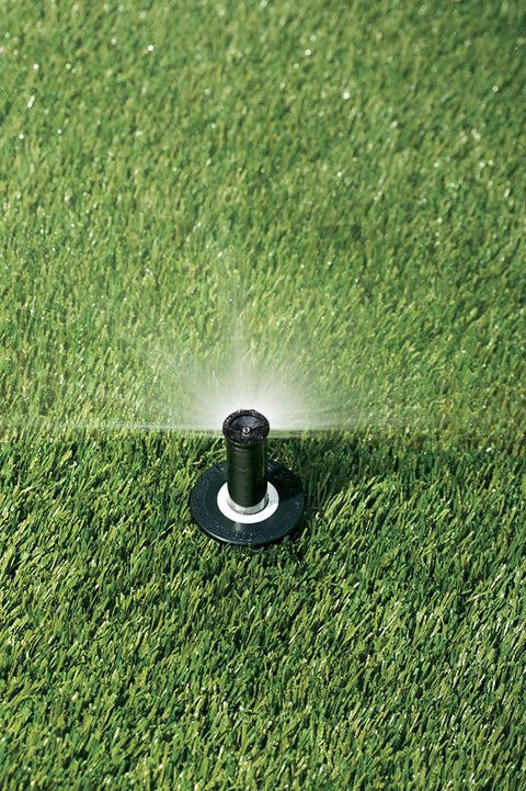 High Efficiency PRS Pop Up Sprinkler 1802HV15PR in operation with grass, 0 to 360 degree adjustable coverage, 2 inch pop up height.