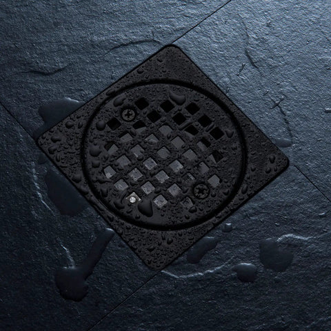 Square 4 Inch Shower Drain Kit With Flange In Matte Black 304 Stainless Steel Grate Replacement Compatible With Schluter Kerdi Systems Includes Drain Grate Set Height Adjustment Collar And Flange CUPC Certified shown installed on wet tile