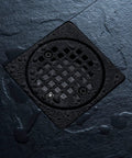 Shower Floor Drain With 12 Inch Flange In Matte Black ABS Construction No Fuss Easy Install For Thin Set Tile 4 Inch Stainless Steel 304 Drain Cover Universal Fit For Standard Shower Trays And Pan Systems, close-up view