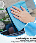 Hand using a blue Ultra Soft Microfiber Glass Cleaning Cloths 12 Pack Streak Free No Lint Wipes for glass surface cleaning