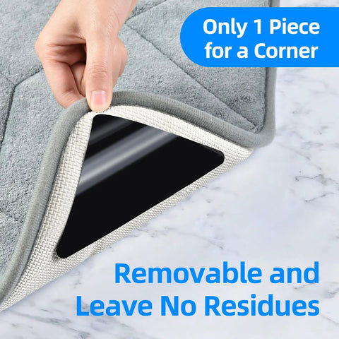 4 Pack No Slip Rug Tape For Hardwood Floors And Tiles Double Sided Adhesive Rug Grippers showing installation on a gray rug corner