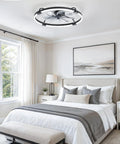 24 Inch Low Profile Ceiling Fan With Brushless Dc Motor And Smart App Remote Brings Fresh Cooling Vibes To Bedrooms Or Living Rooms While Featuring Stepless Dimmable LED Light And Tunable Warm Cool Tones In Matte Black in a modern bedroom setting.