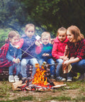Children and an adult roasting marshmallows using 32 Inch Telescoping Marshmallow Roasting Sticks Set For Campfire Open Fire Pit S'mores Skewers Perfect For Roasting Marshmallows, Hot Dogs, And Sausages, 5 Pack With Bright Color Tips For Easy Grilling And Campout Vibes All Night.