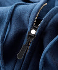 Close-up view of zipper slider on blue fabric using Zipper Repair Kit With Slider Fix Tool Quick Zip Replacement Instant Zipper Mending Set Slider Substitute Pack Repair Kit For Jackets Bags And Travel Gear Easy DIY Fix