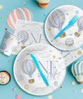 Hot Air Balloon 1st Birthday Party Supplies Set For Boys Mr Onederful Themed Tableware Pack Including Plates Napkins Cups And Cutlery In Blue For 24 Guests Lil Man Approved showing plates, cups, napkins, and blue cutlery with balloon design.