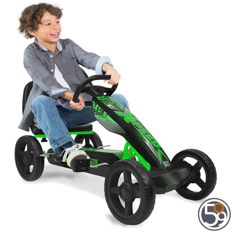Child riding a green pedal go kart for kids with durable steel frame and easy pedal power, promoting safe outdoor fun.