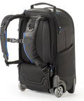Streetwalker Rolling Camera Backpack with dedicated laptop pocket and minimalist black exterior, wheels and straps view