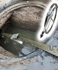 Badass Manganese Steel Sewer Snake With Drain Auger Coils used in outdoor catch basin with murky water.