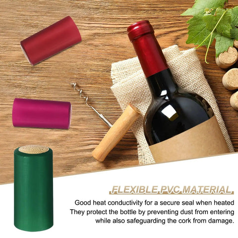 Top Shelf Green Pvc Heat Shrink Bottle Caps 60 Pack 30X60Mm Wine Sealer with red and pink caps on a wooden table.