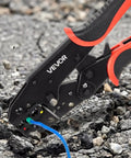 Heavy Duty Ratcheting Wire Crimper Pliers For 22 To 10 AWG Electrical Terminals in action on gravel surface.