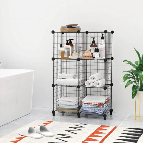 Wire Cube Storage Organizer With 9 Cube Bookcase Open Grid Shelves holding bathroom items and towels in a modern decor.