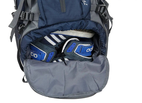 Sleeping bag compartment of a 50L Waterproof Hiking Backpack with shoes