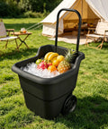 Heavy Duty 15 Gallon Rolling Garden Cart With Retractable Handle And 7 Inch Wheels For Outdoor Yard Work A Real Workhorse Lightweight Resin Utility Wagon For Gardening Lawn And Home Hauling loaded with ice and fruit.