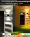 Outdoor Wall Light With RGB Color Changing And Warm White, 1000lm, mounted on house exterior, illuminating patio area