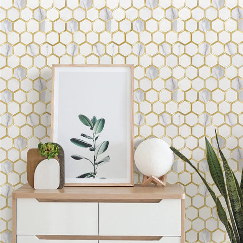 Hexagon Peel And Stick Backsplash Tiles With White Marble Look And Gold Accents For Kitchen And Bathroom in a modern decor setting