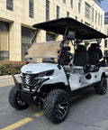 White Electric Golf Cart Featuring Fourteen Inch All Terrain Tires And Spacious Kick Back Seating Built Tough For Smooth Cruising with black wheel rims