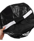 Golf Swing Trainer Bag Impact Hitting Bag For Indoor And Outdoor Practice, black compact design shown in hand