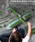 Child assembling 285 Piece Model Airplane STEM Build Set For Kids Ages 8 12 16 Hands On Science Kit With Simple Assembly Puzzle Kid Approved Fun Educational Toy Birthday Gift For Boys And Girls, featuring green metal airplane parts.