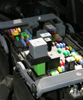 Engine bay with varied relays suitable for Four Piece Relay Test Jumper Kit For Cars And Trucks Universal Jumpers