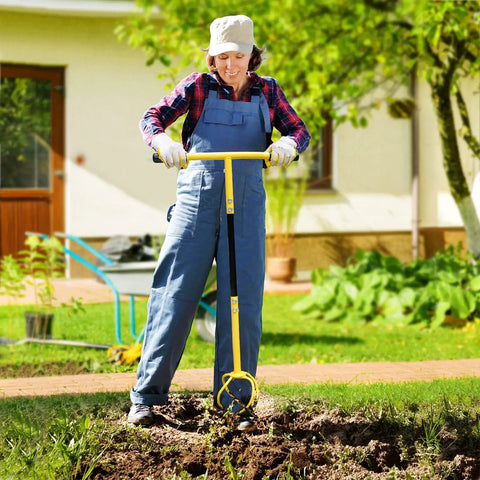 Woman using Manual Twist Tiller For Gardening With Seventeen Inch Arc Handle And Ergonomic Grip Garden Claw Cultivator in a yard.
