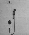 Shower Faucet System, 10-Inch Round Head, 5-Spray Handheld, Matte Black against a textured gray wall.