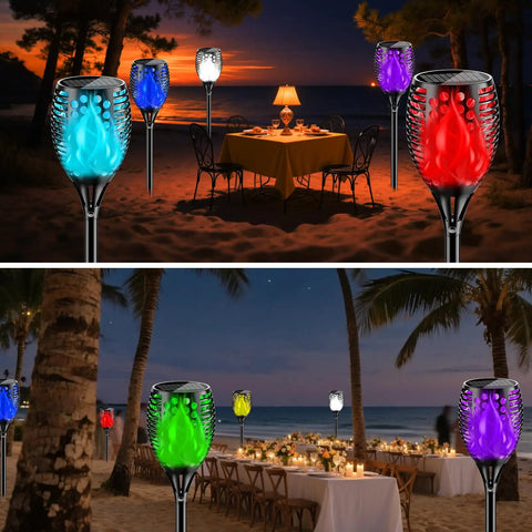 Outdoor RGB Solar Flame Lights 4 Pack With Seven Color Flickering Fire Effect illuminating beachside dinner setting