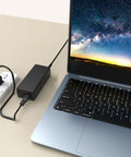 Universal AC Adapter Charger For Vornado Smart Air Circulator Fans 693DC 623DC 610DC 683DC connected to a laptop and power strip