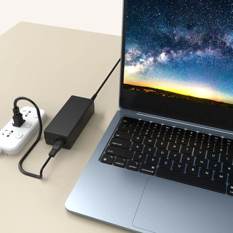 Universal AC Adapter Charger For Vornado Smart Air Circulator Fans 693DC 623DC 610DC 683DC connected to a laptop and power strip