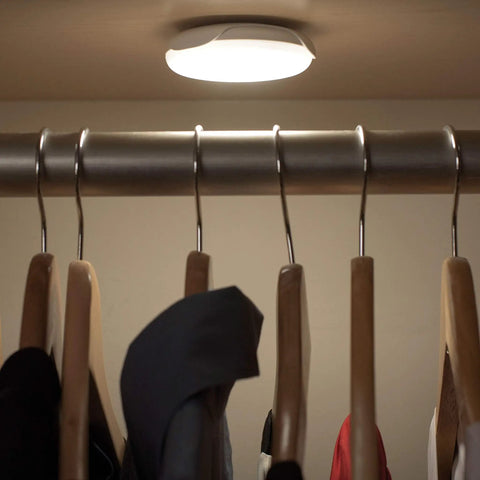Battery Operated LED Puck Light For Under Cabinets And Shelves With Motion Sensor And Auto Shut Off After 20 Seconds in closet