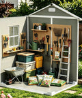 6x4 Ft Outdoor Resin Storage Shed With Floor And Window, showcasing gardening tools, lawn equipment, and supplies